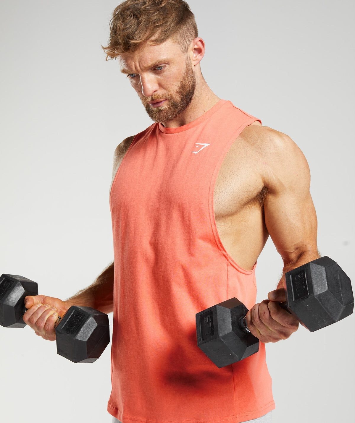 gymshark-react-drop-arm-tank-aerospace-orange-ss23
