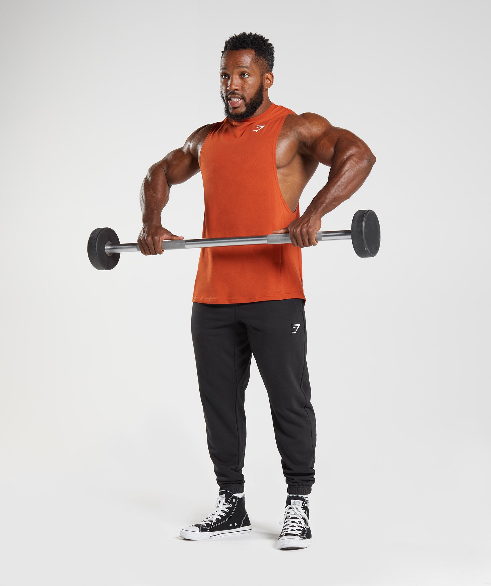 gymshark-react-drop-arm-tank-cayenne-red-aw22