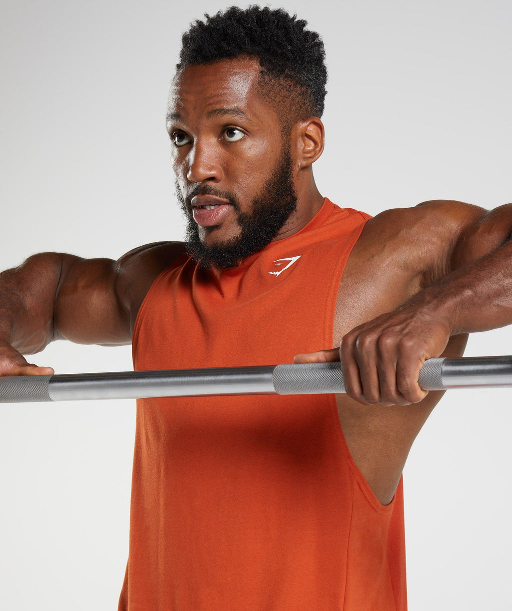 gymshark-react-drop-arm-tank-cayenne-red-aw22