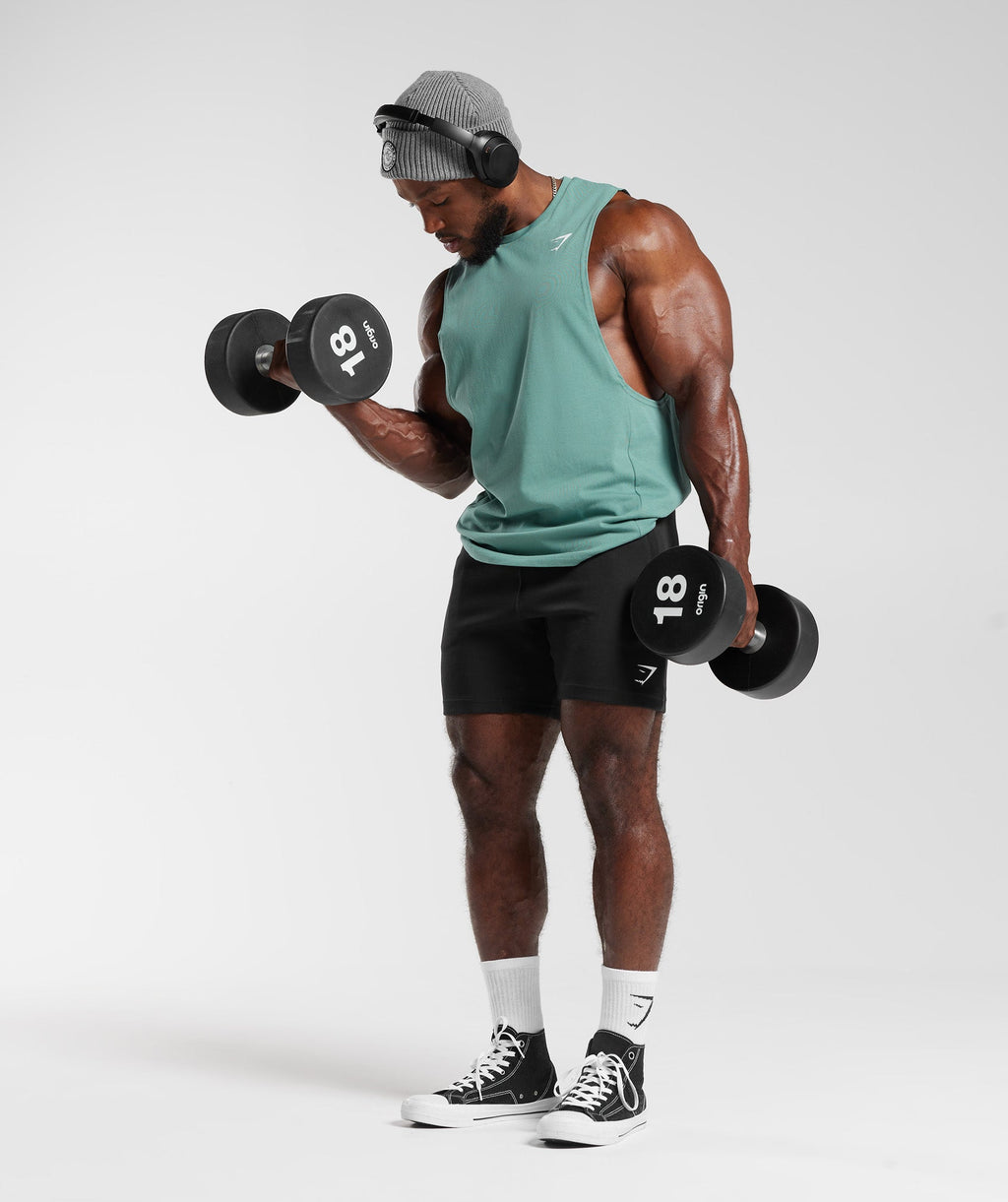 gymshark-react-drop-arm-tank-ink-teal-ss23
