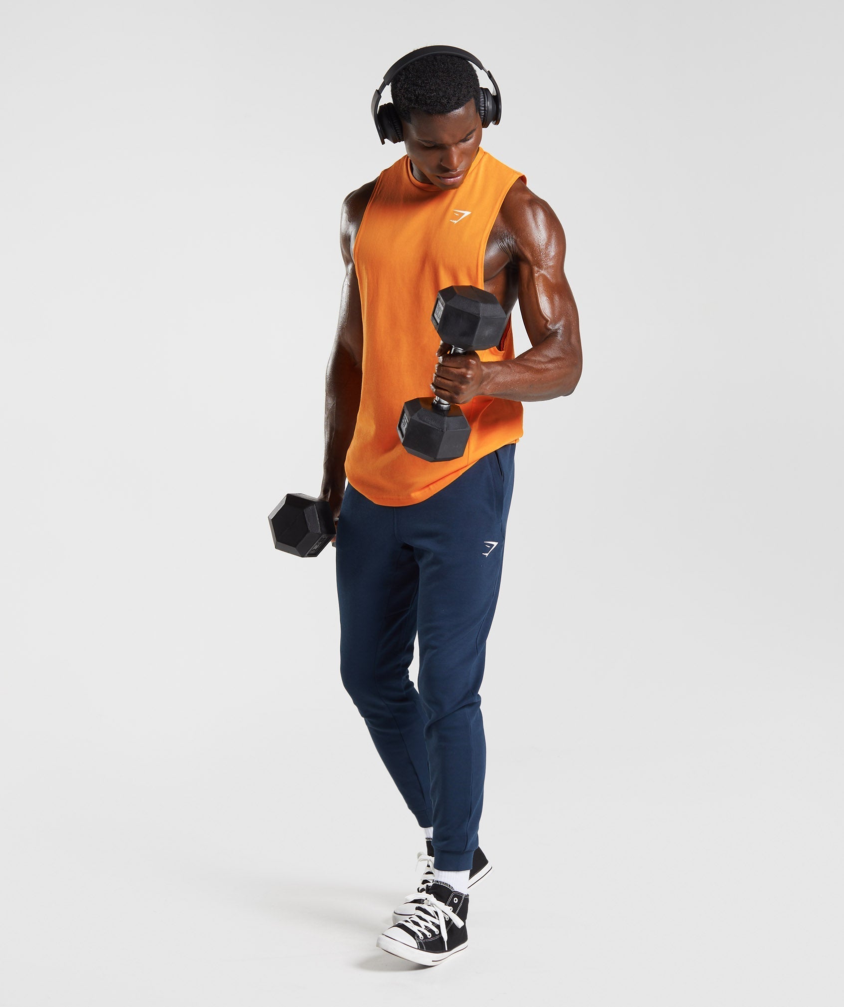 gymshark-react-drop-arm-tank-sunburst-orange-aw22