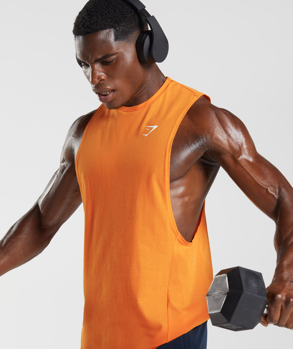 gymshark-react-drop-arm-tank-sunburst-orange-aw22
