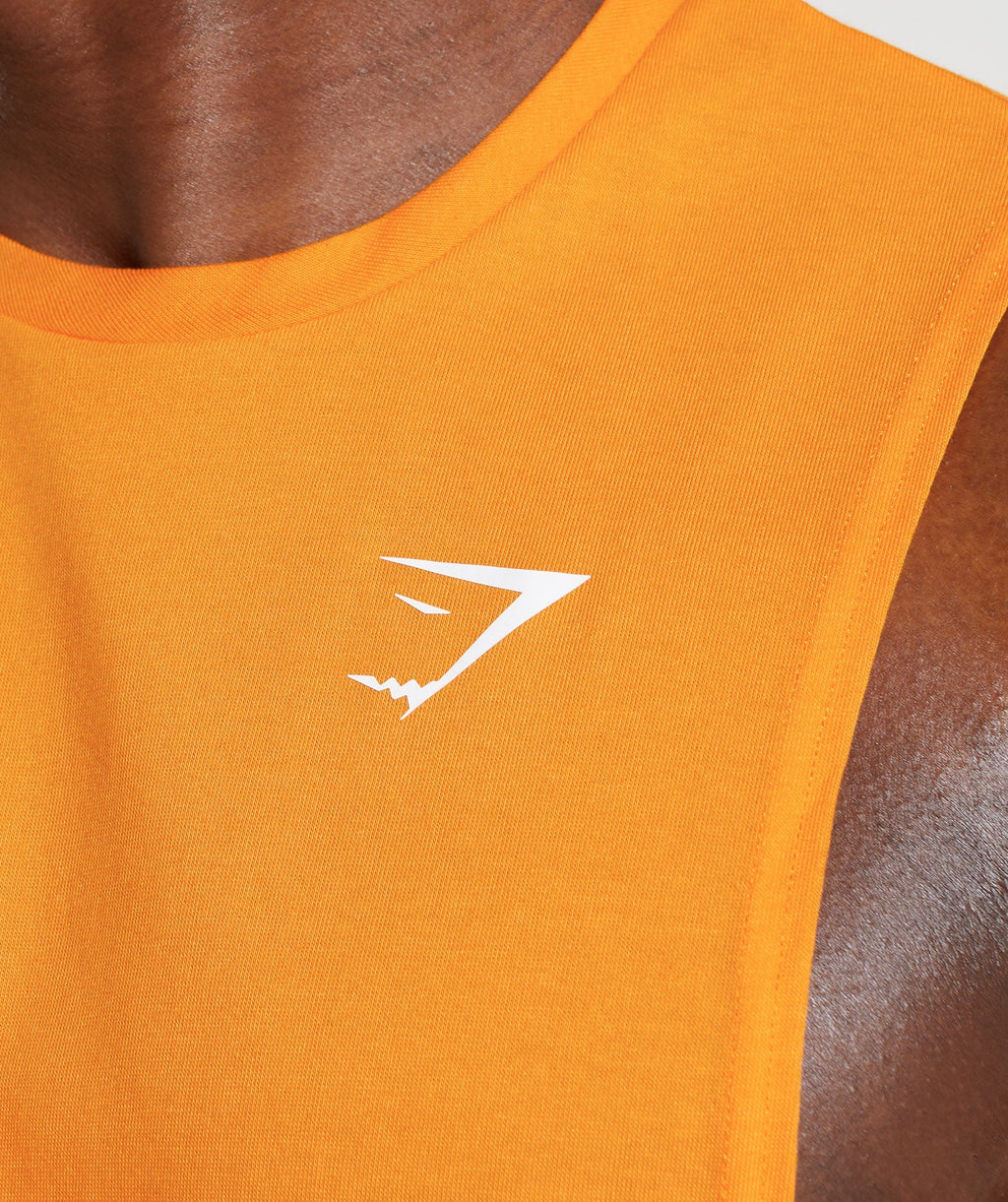 gymshark-react-drop-arm-tank-sunburst-orange-aw22