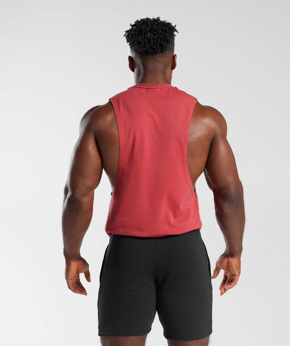 gymshark-react-drop-arm-tank-sundried-red-ss23