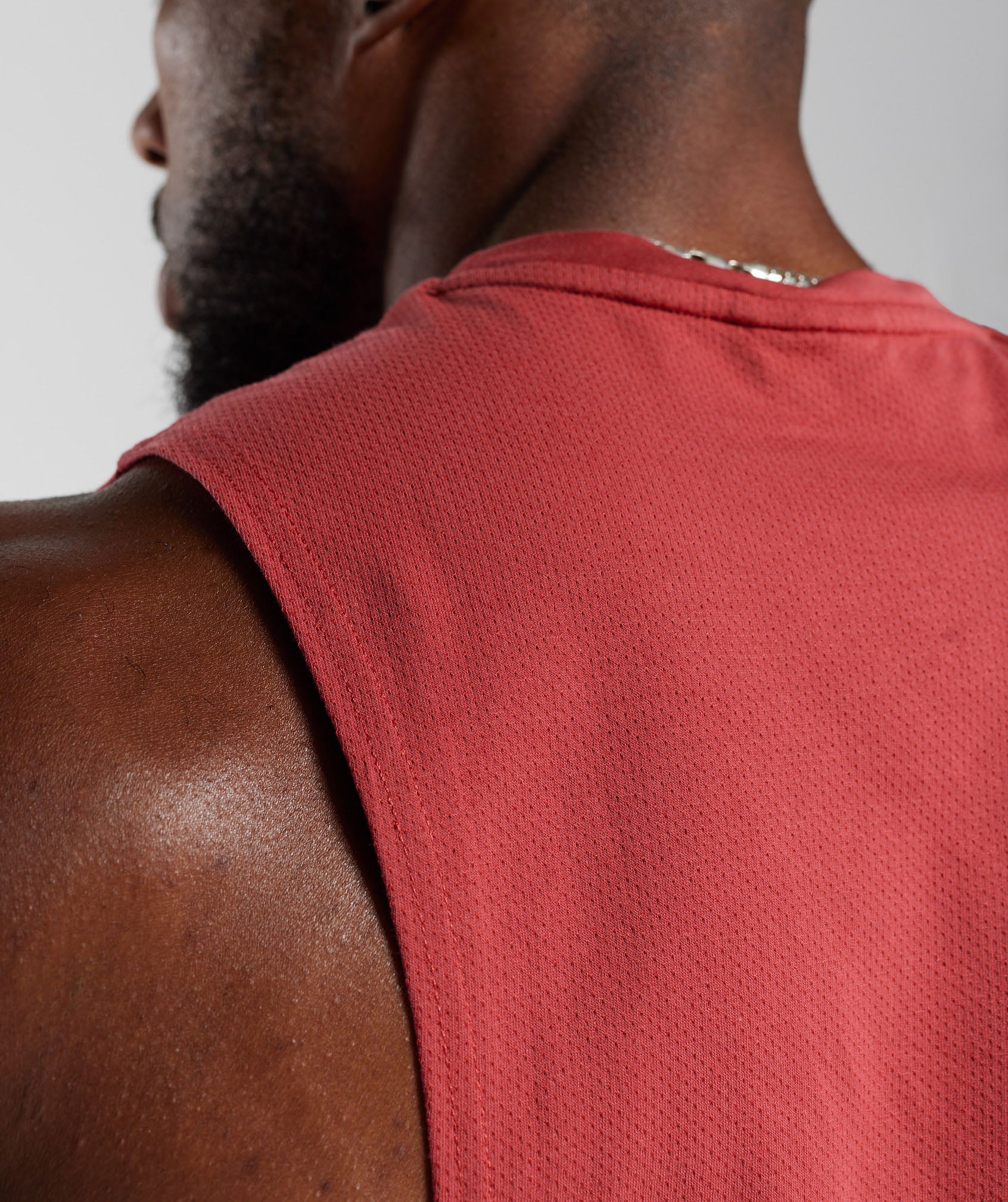 gymshark-react-drop-arm-tank-sundried-red-ss23