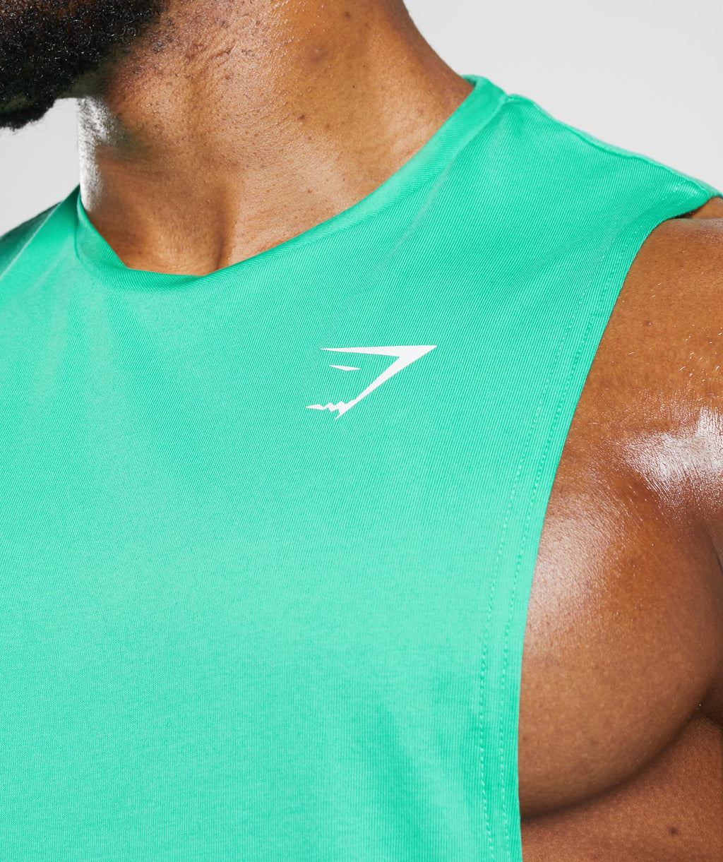 gymshark-react-drop-arm-tank-tropic-green-ss23