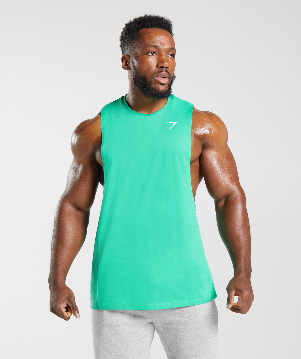 gymshark-react-drop-arm-tank-tropic-green-ss23