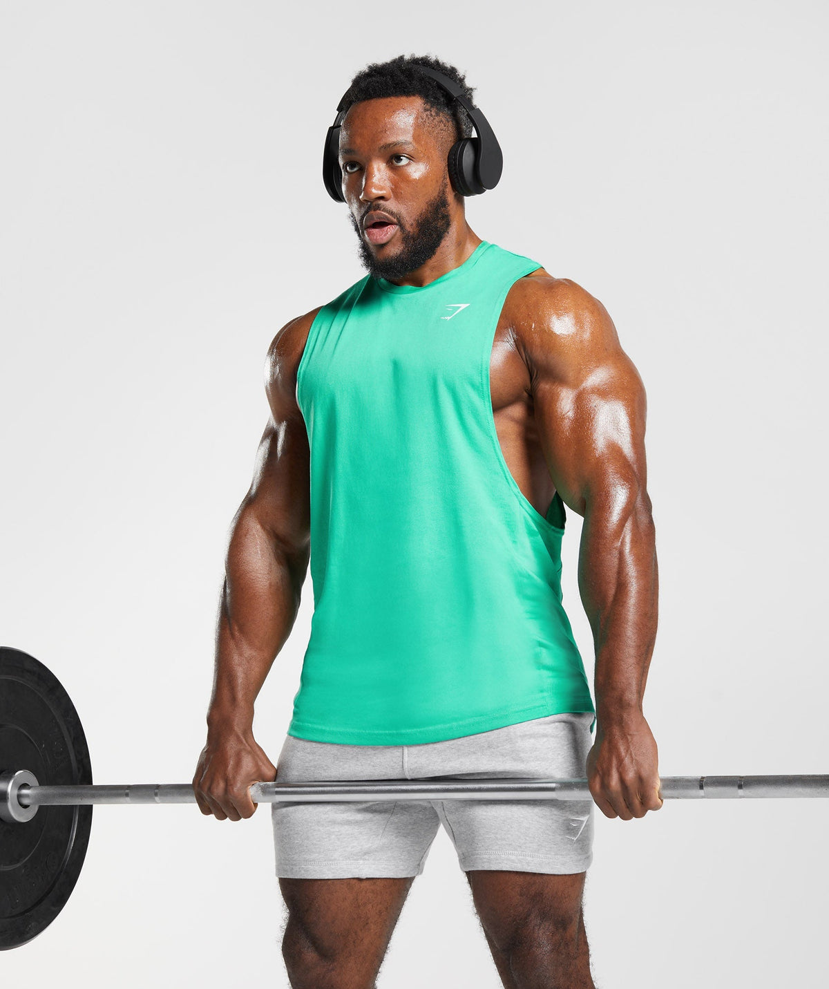 gymshark-react-drop-arm-tank-tropic-green-ss23