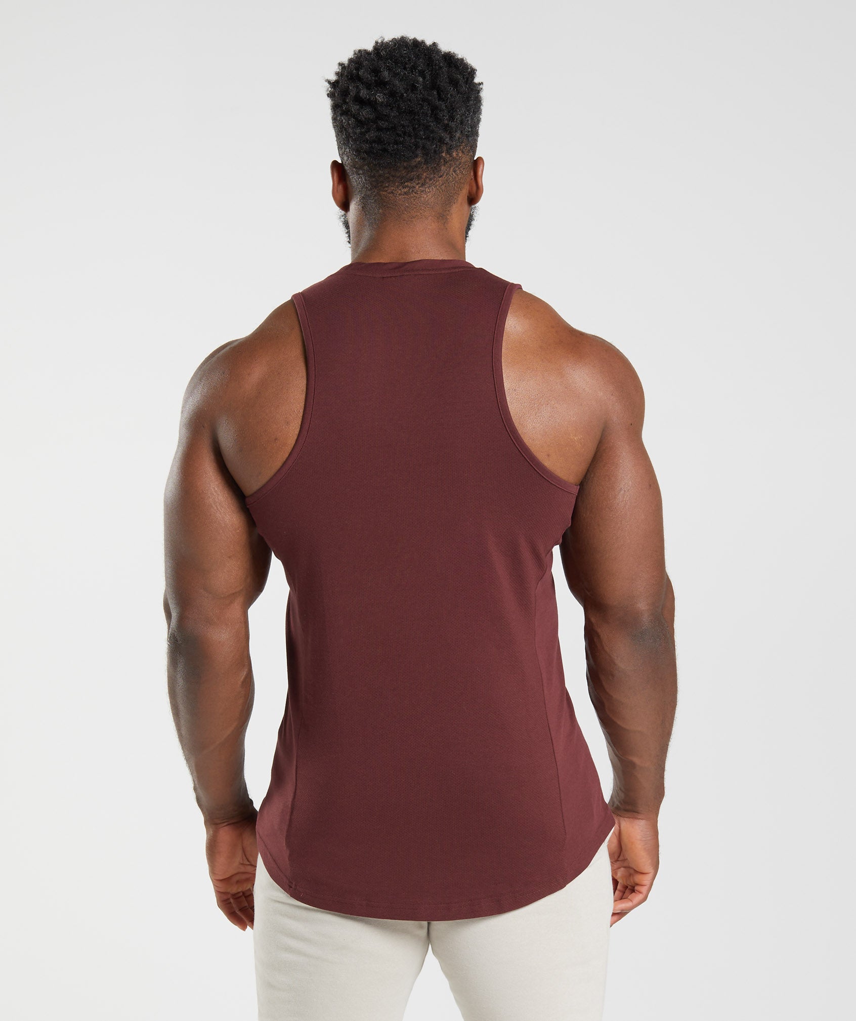 gymshark-react-tank-baked-maroon-aw22