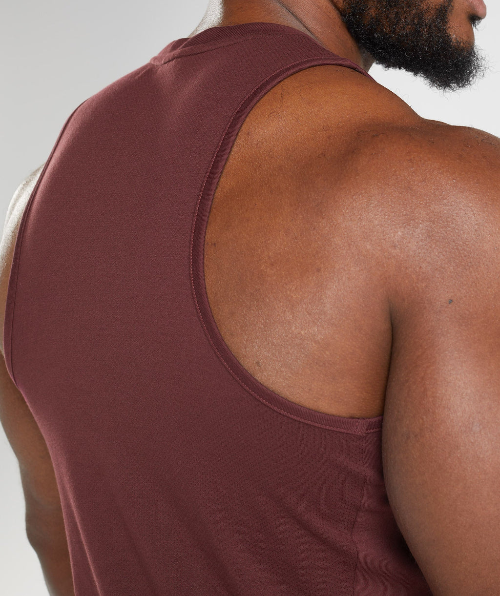 gymshark-react-tank-baked-maroon-aw22