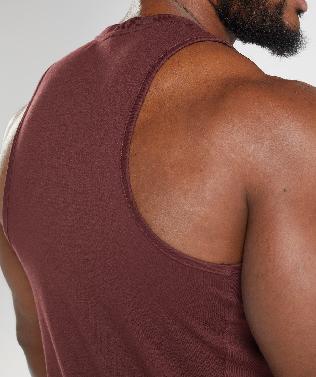 gymshark-react-tank-baked-maroon-aw22