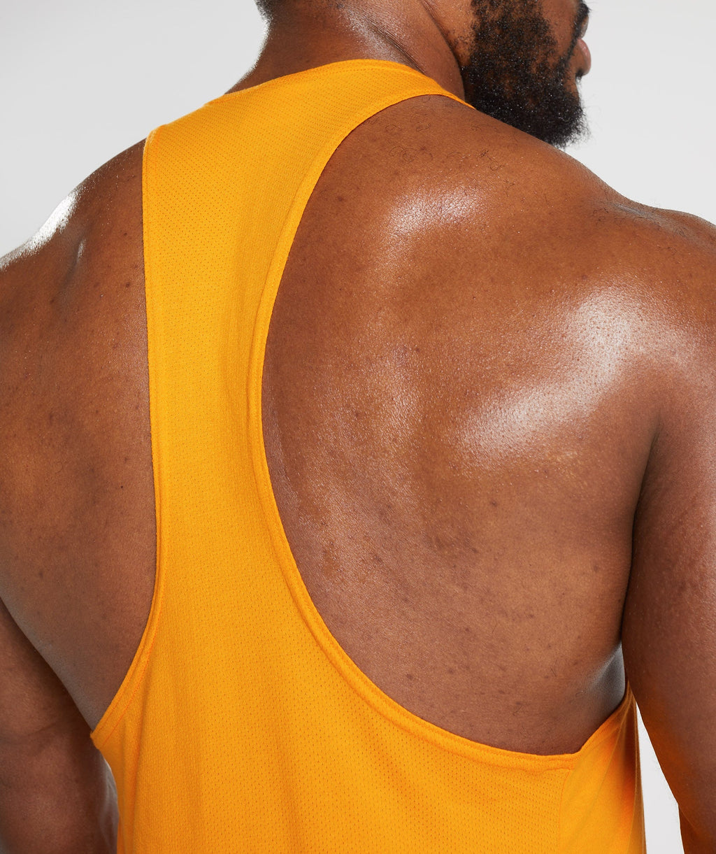 gymshark-react-stringer-sunburst-orange-aw22