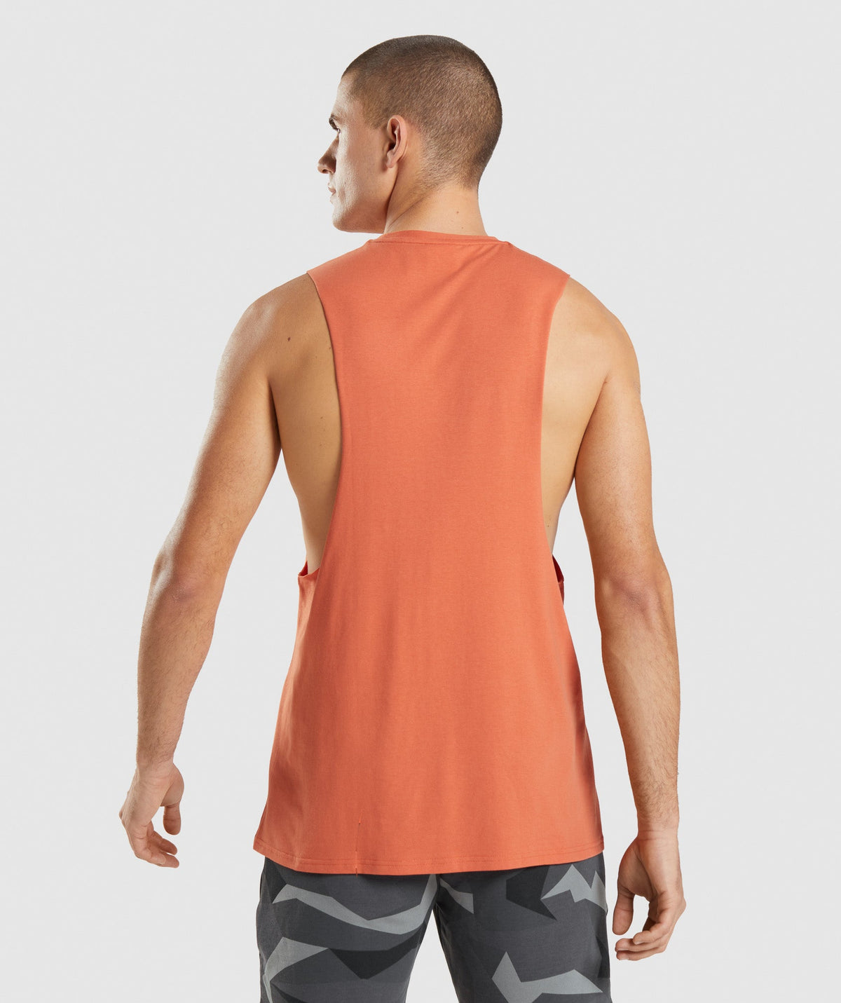 gymshark-critical-drop-arm-tank-clay-orange-ss22