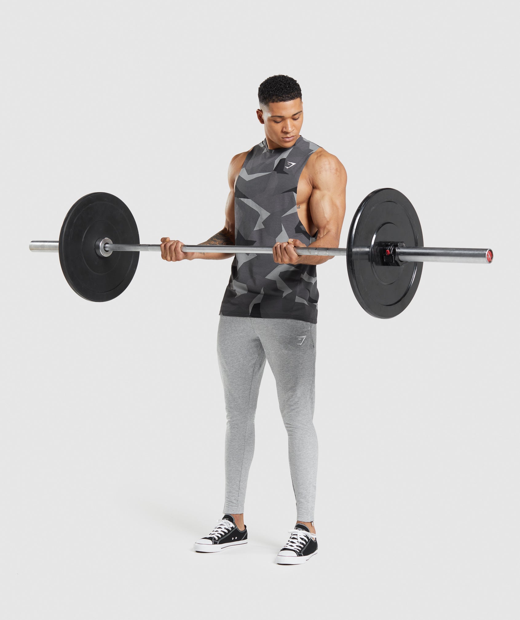 gymshark-critical-drop-arm-tank-black-print-ss22