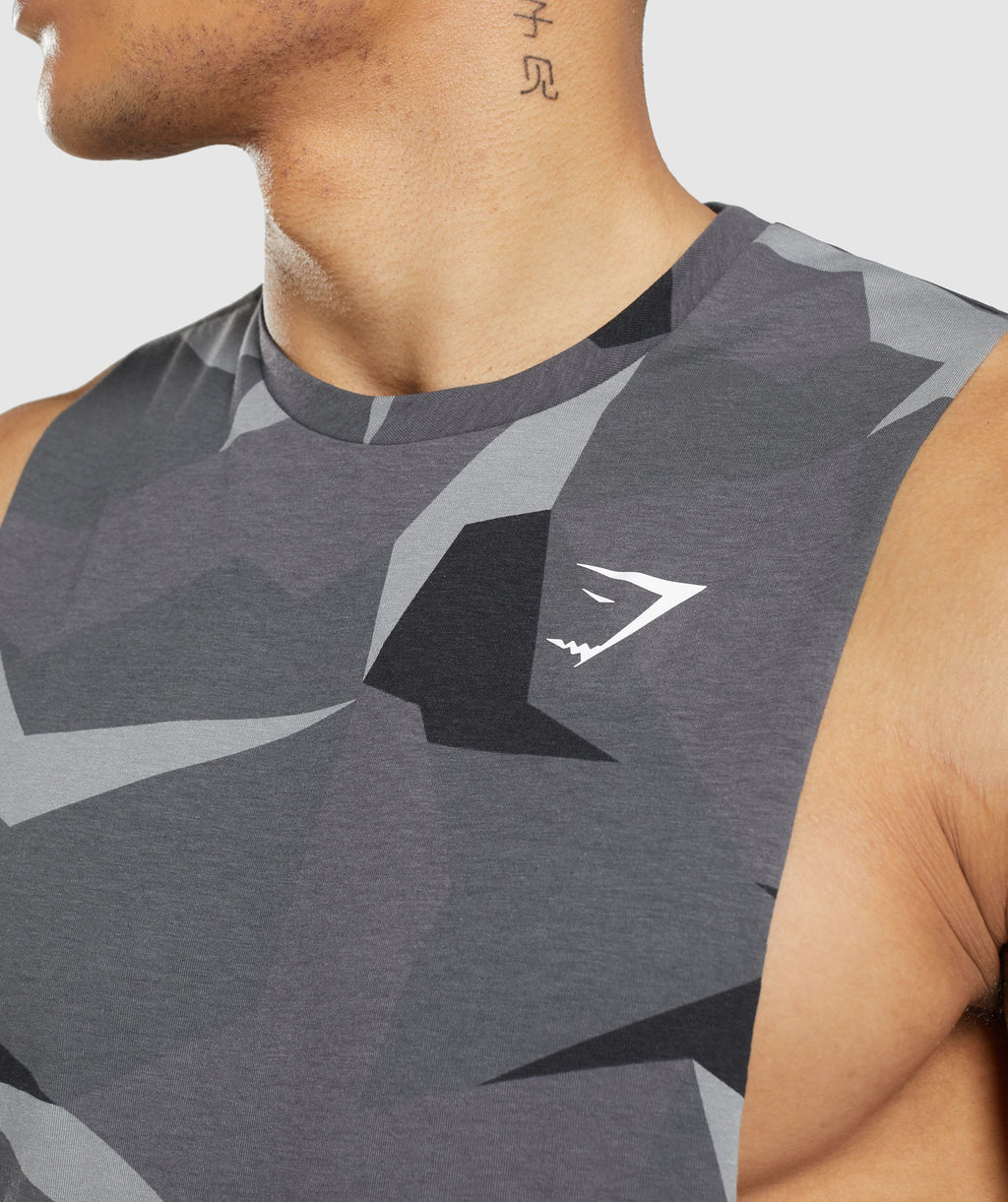 gymshark-critical-drop-arm-tank-black-print-ss22