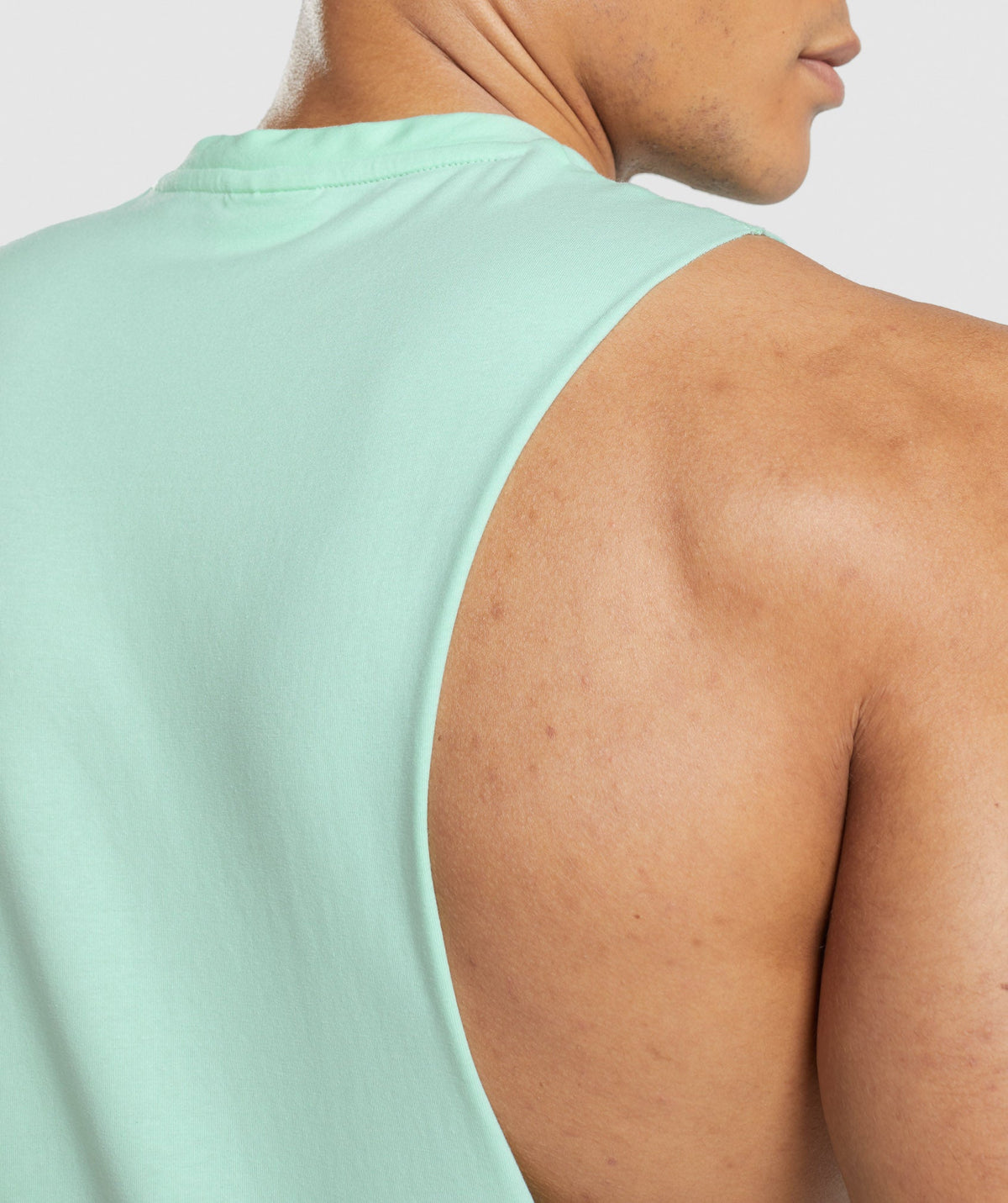 gymshark-critical-drop-arm-tank-turbo-blue-ss22