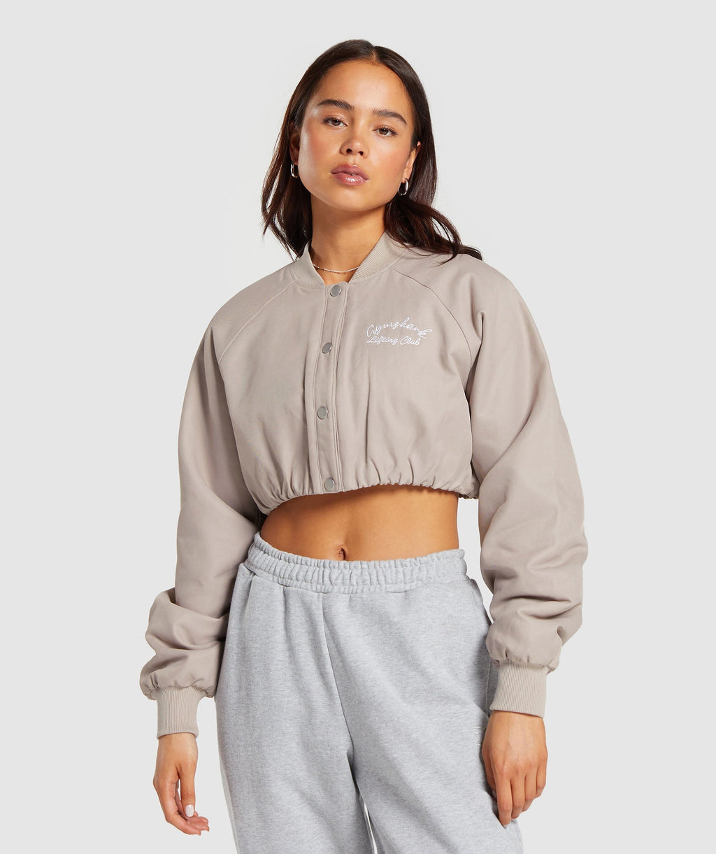 gymshark-cropped-bomber-jacket-stone-pink-ss24