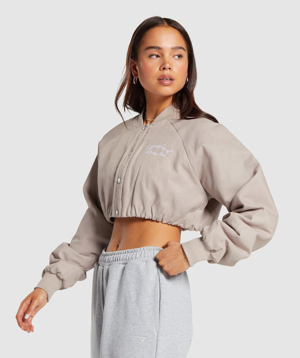 gymshark-cropped-bomber-jacket-stone-pink-ss24