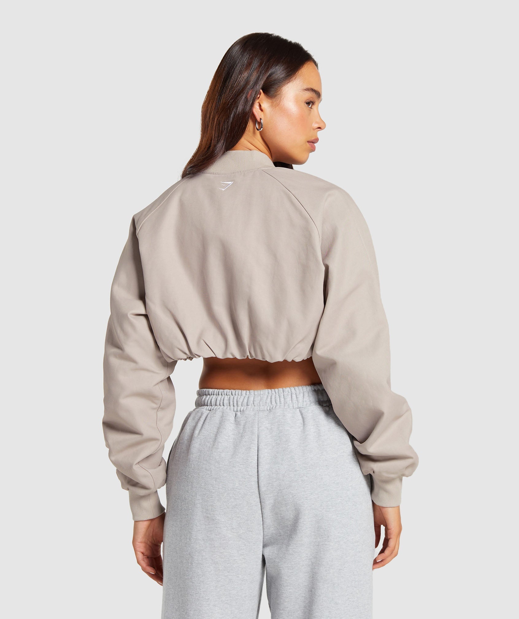 gymshark-cropped-bomber-jacket-stone-pink-ss24