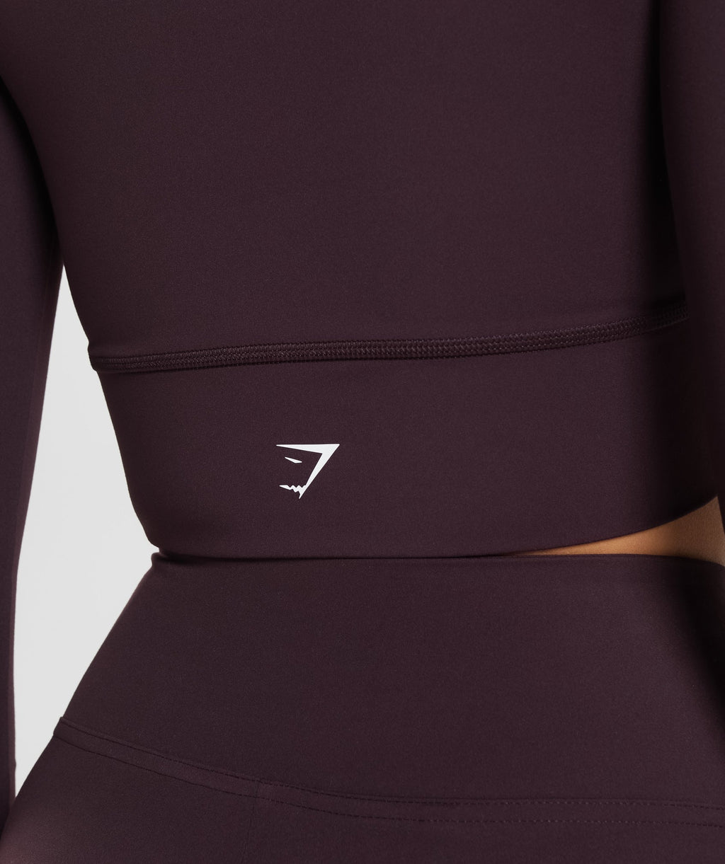 gymshark-crossover-long-sleeve-crop-top-plum-brown-aw23