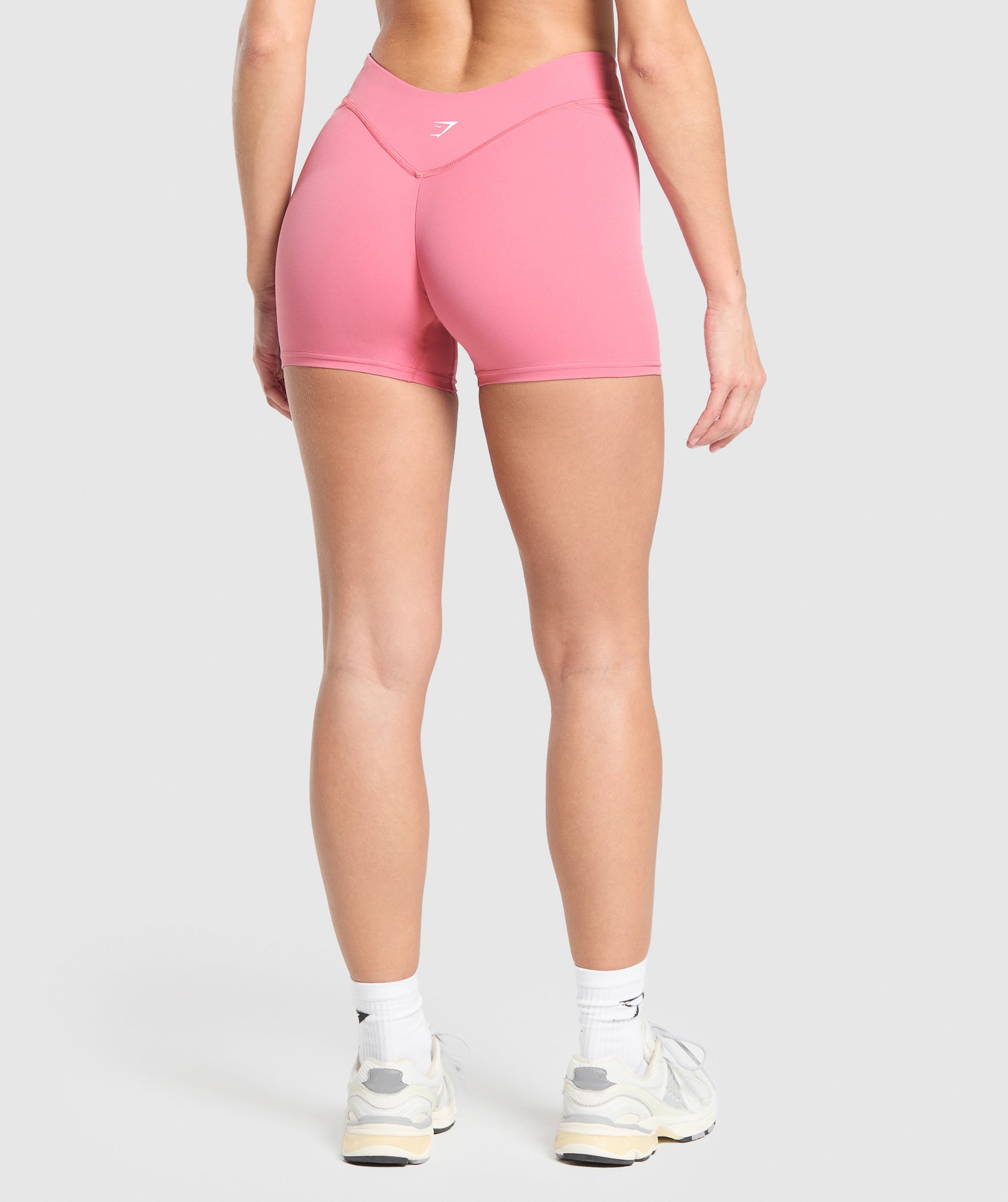 gymshark-dipped-waistband-shorts-sunset-pink-ss25