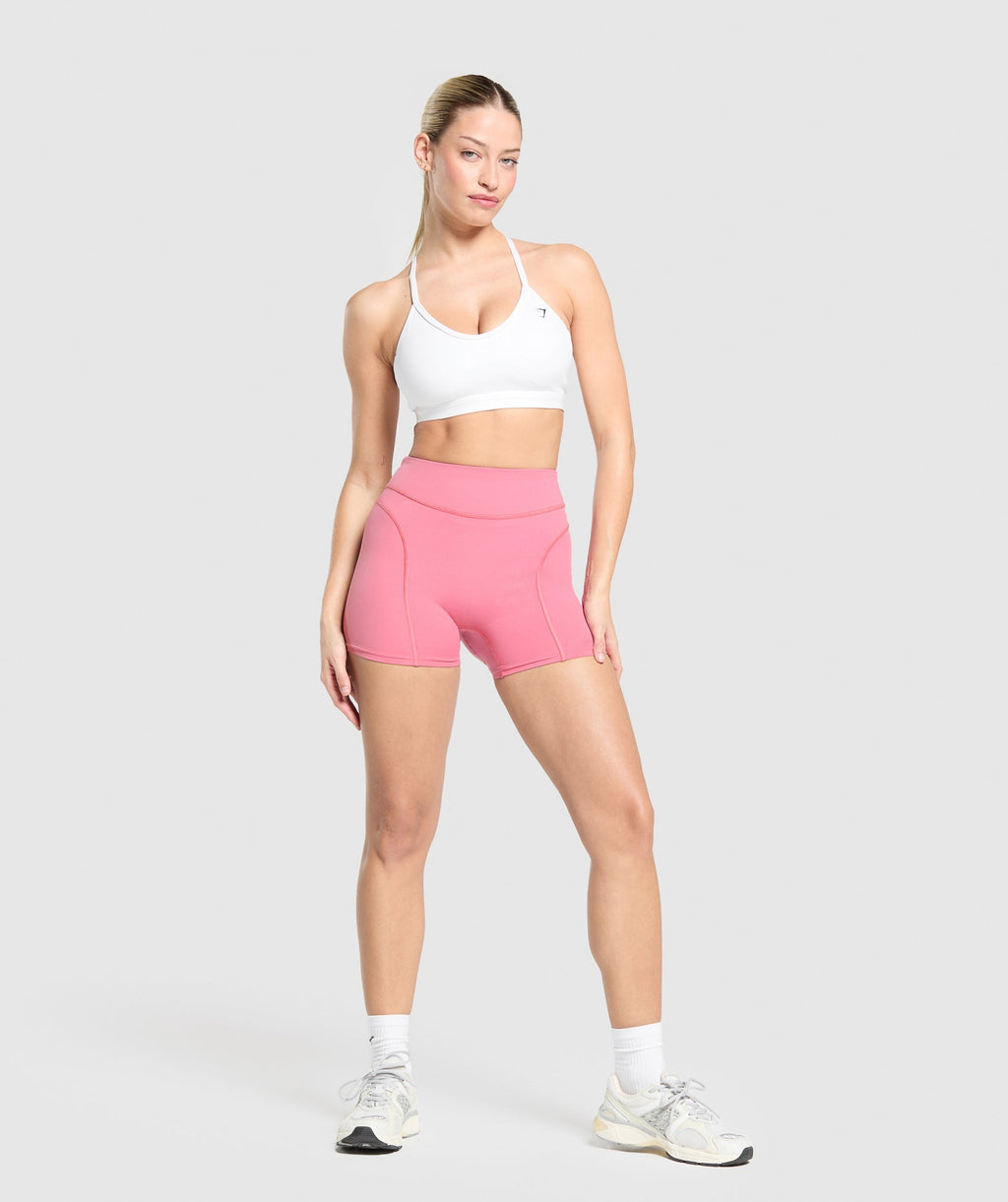gymshark-dipped-waistband-shorts-sunset-pink-ss25