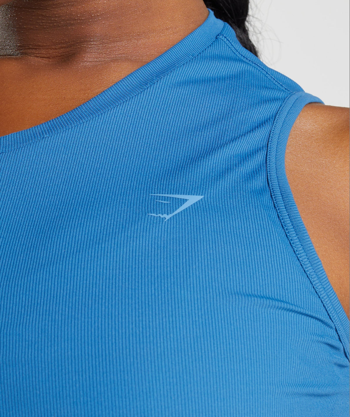 gymshark-elevate-asymmetric-tank-lakeside-blue-aw22