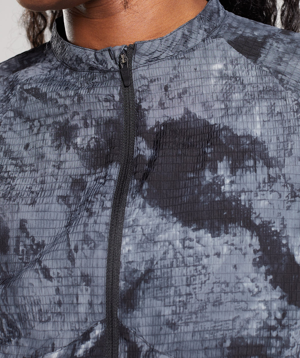 gymshark-elevate-woven-jacket-coin-grey-spray-dye-aw22