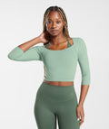 gymshark-elevate-3-4-sleeve-crop-top-desert-sage-green-ss23