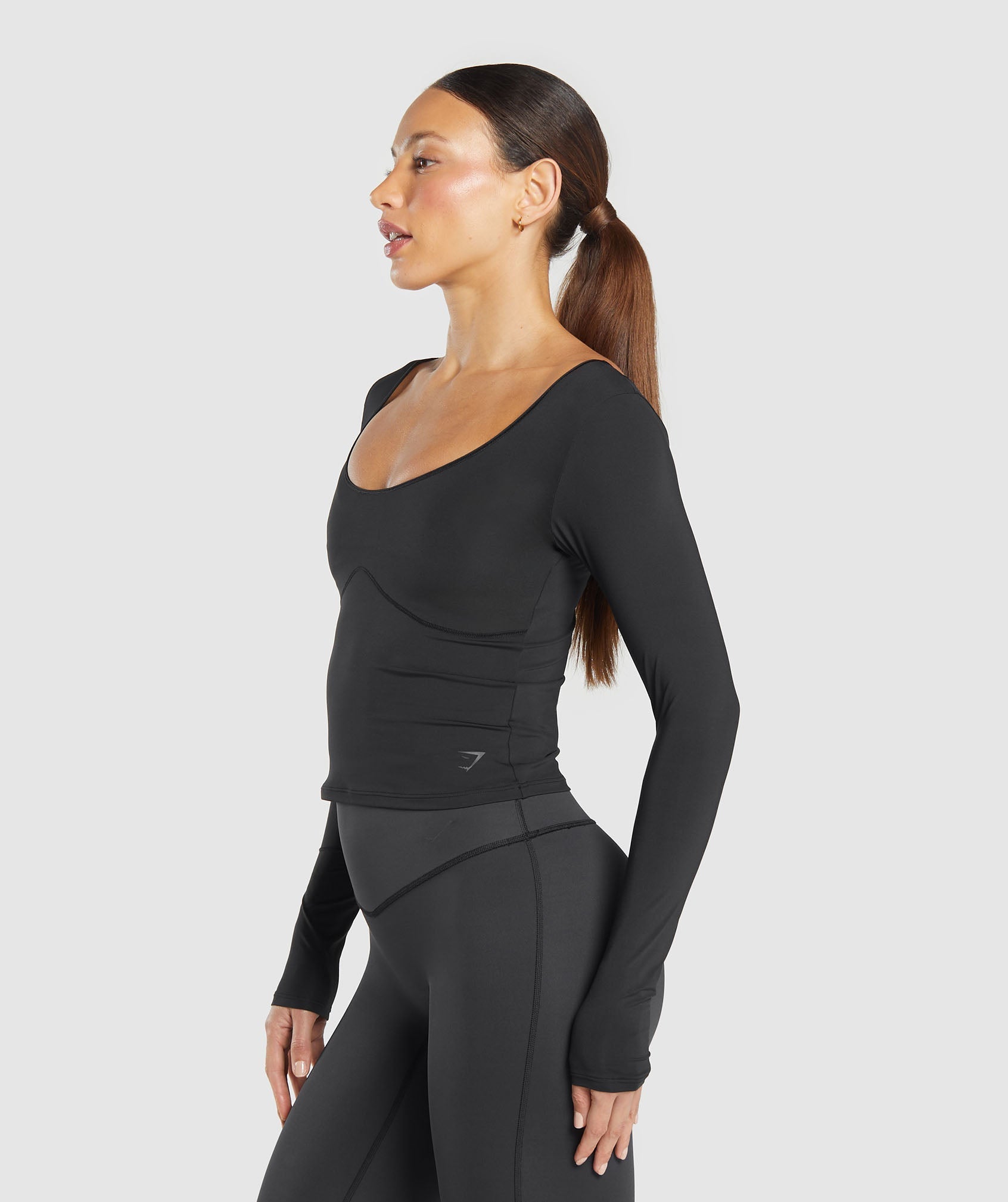 gymshark-elevate-long-sleeve-top-black-ss25