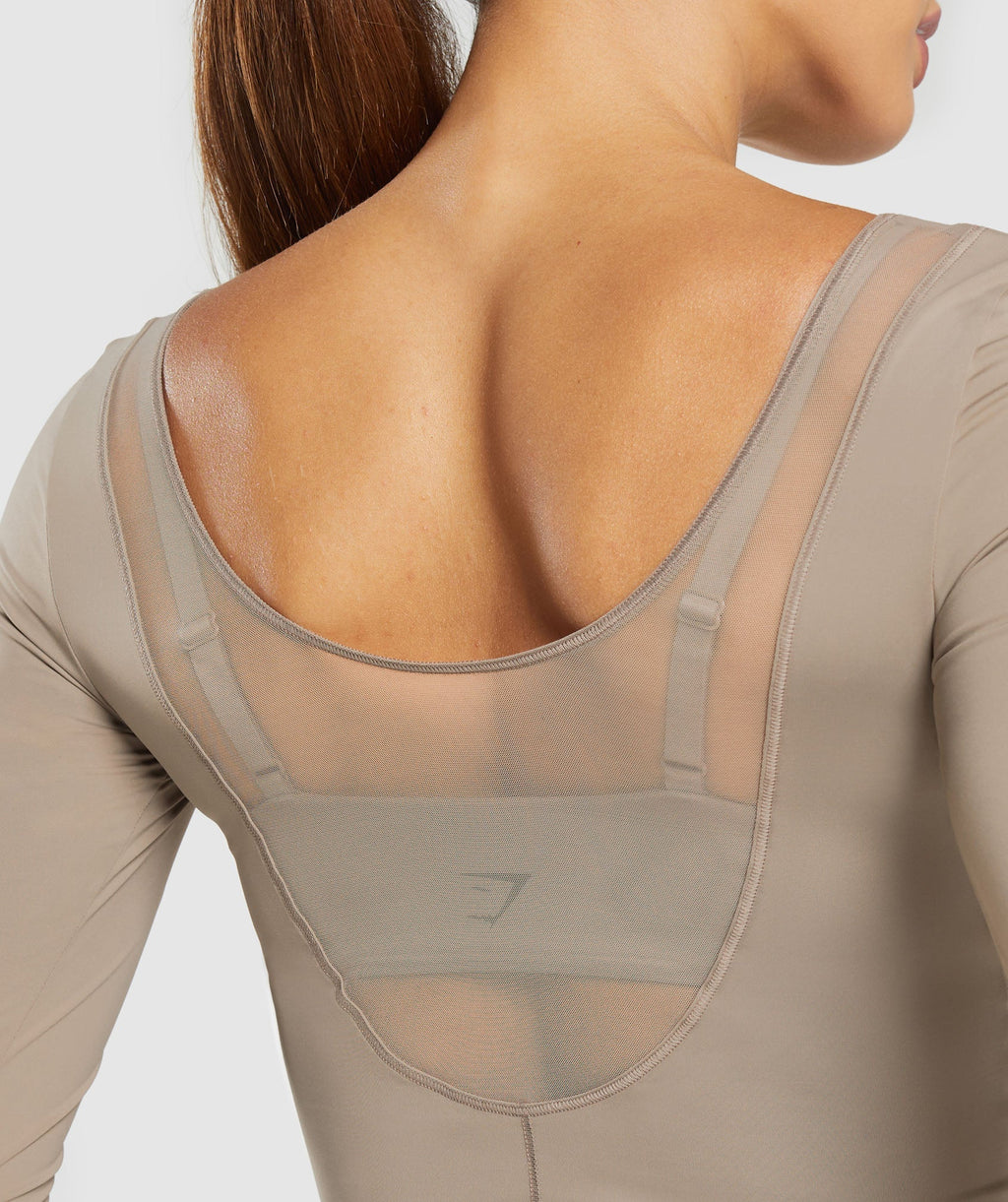 gymshark-elevate-long-sleeve-top-lifestyle-brown-ss25