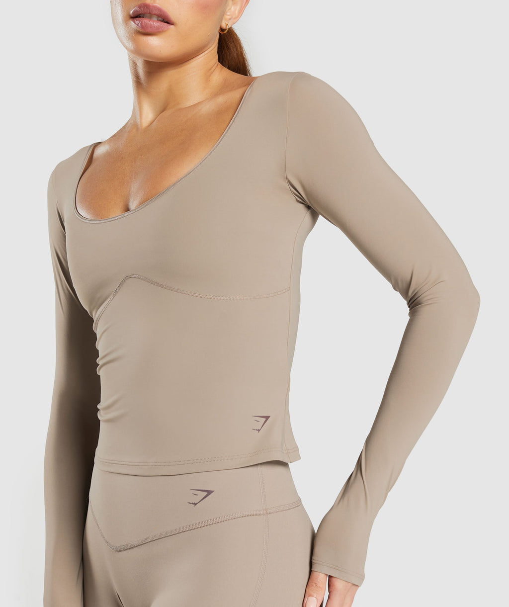 gymshark-elevate-long-sleeve-top-lifestyle-brown-ss25