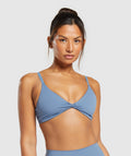 gymshark-elevate-twist-front-bralette-faded-blue-ss24