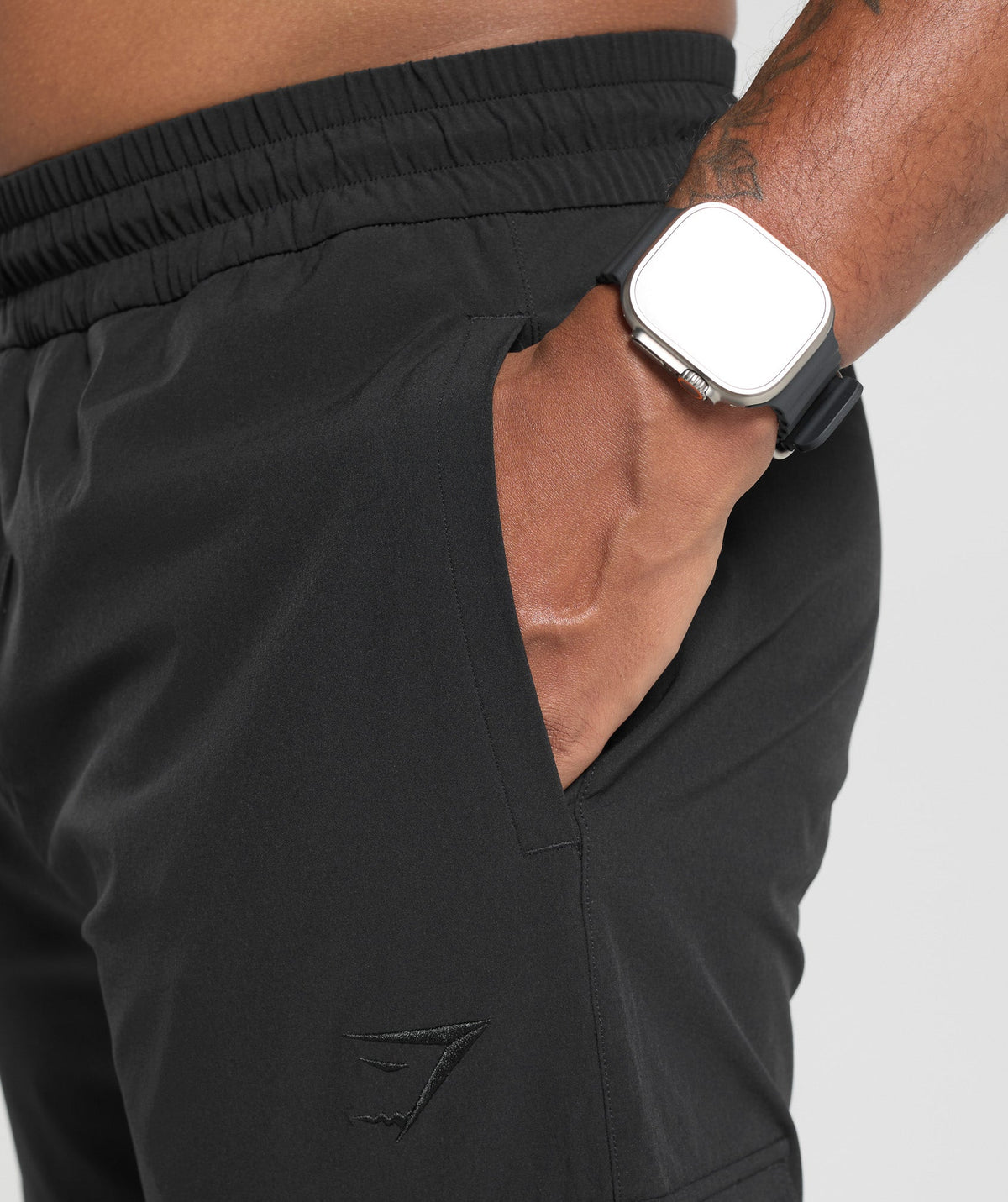 gymshark-stretch-woven-cargo-pants-black-ss24