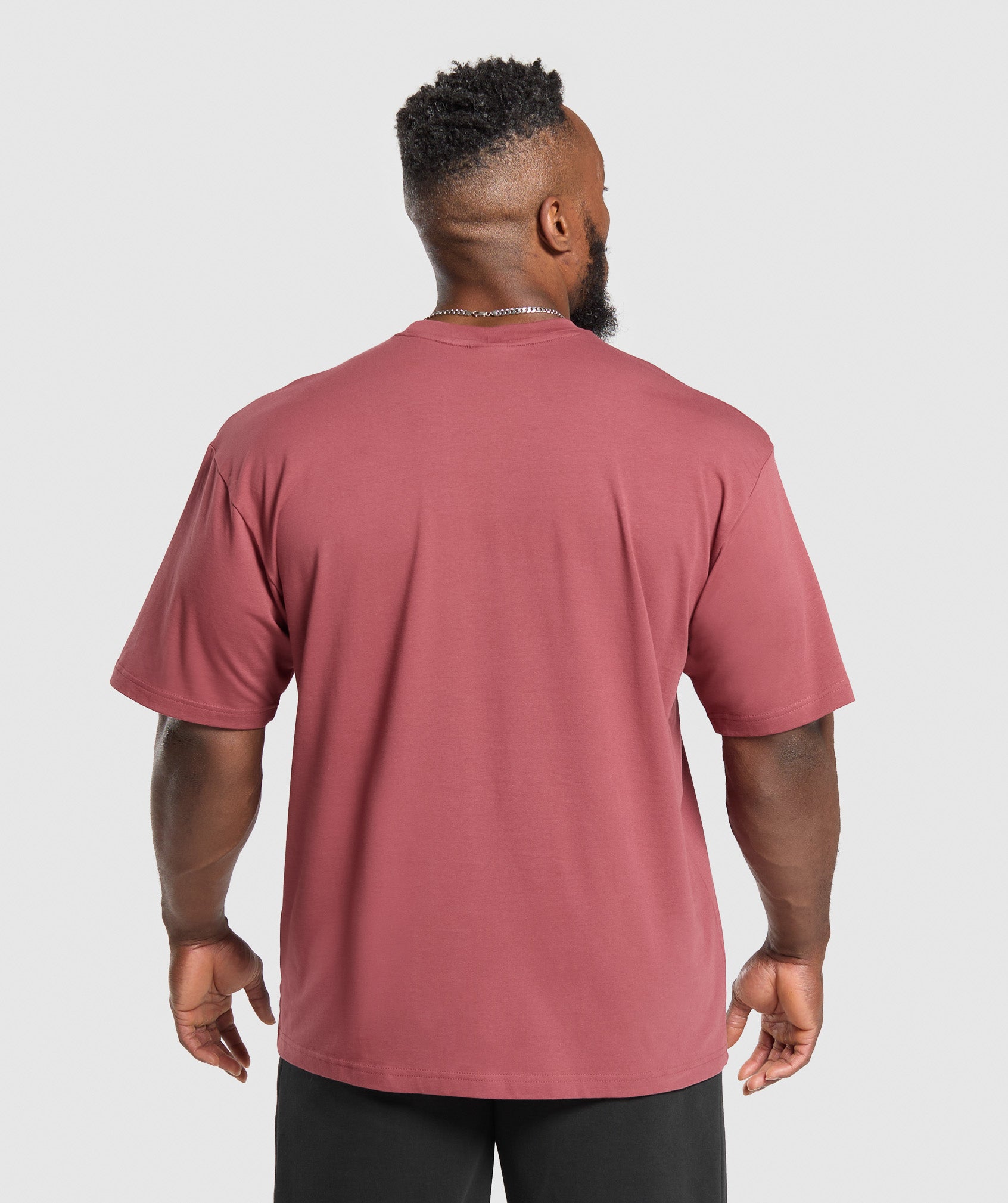 gymshark-essential-oversized-t-shirt-washed-berry-pink-ss25