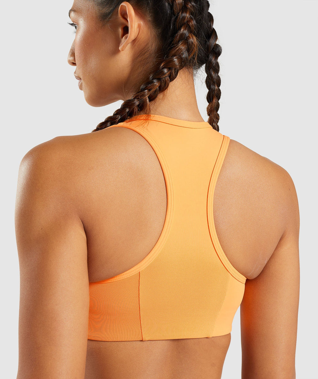 gymshark-essential-racer-back-sports-bra-apricot-orange-ss22