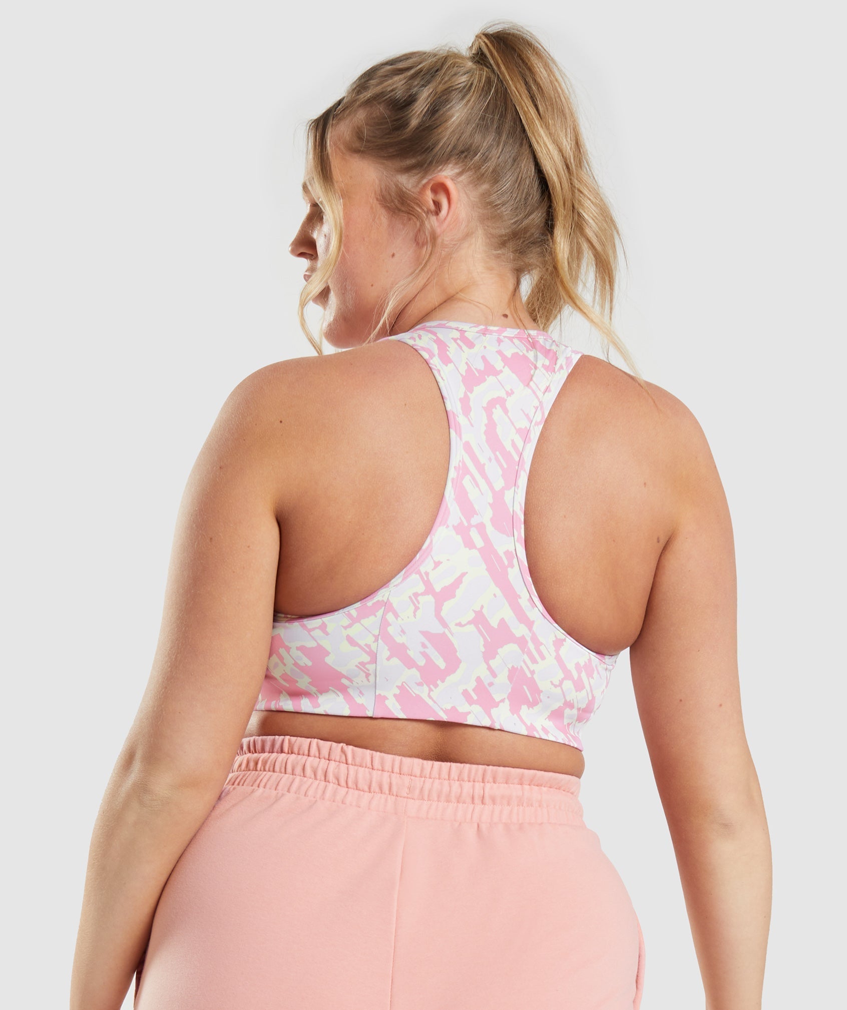 gymshark-essential-racer-back-sports-bra-pink-print-ss22
