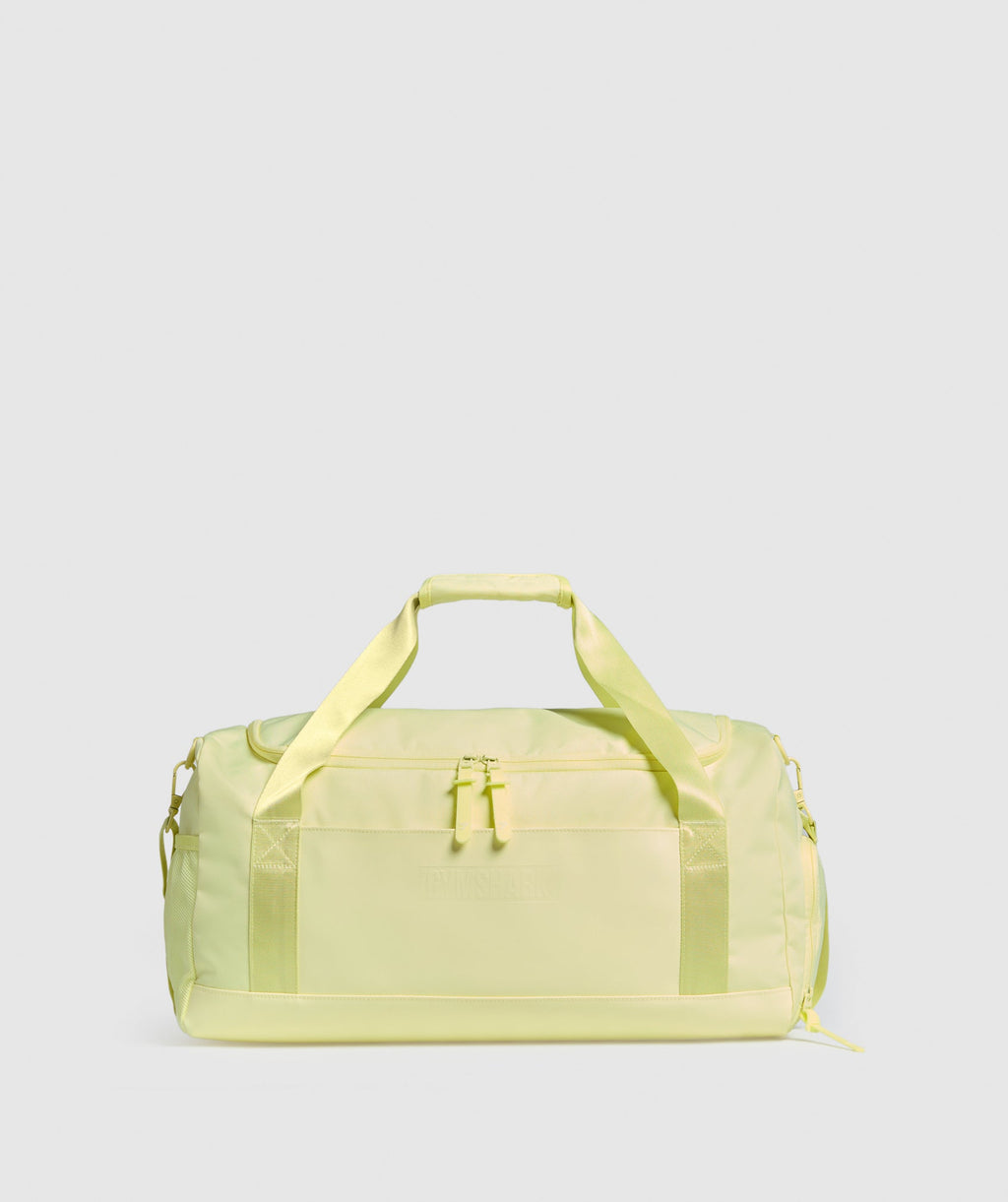 gymshark-everyday-holdall-small-bags-yellow-ss25