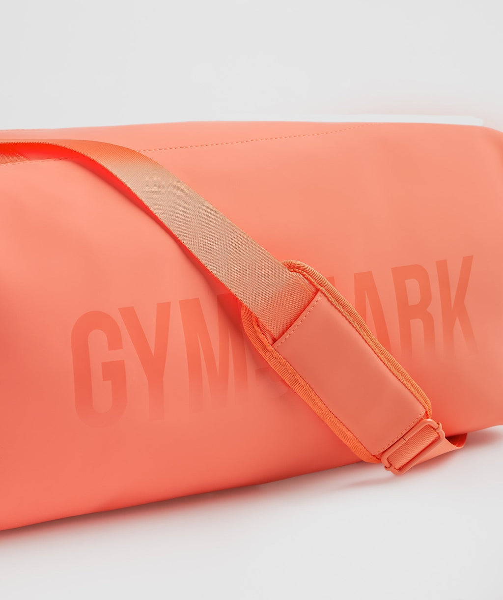 gymshark-small-everyday-holdall-solstice-orange-ss23