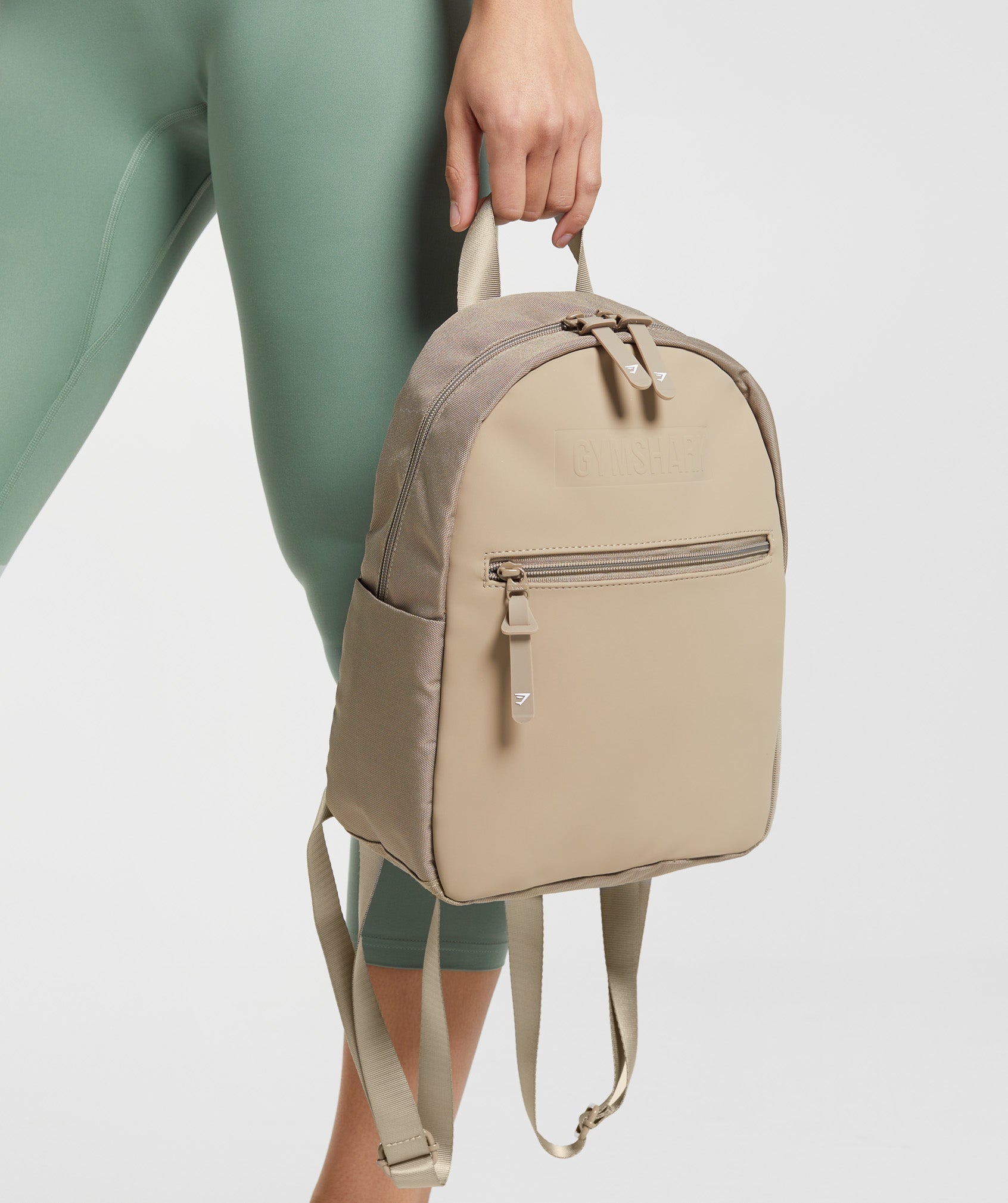 gymshark-everyday-mini-backpack-cement-brown-ss23