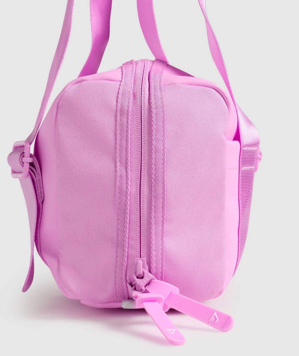 gymshark-everyday-mini-holdall-sour-pink-ss25