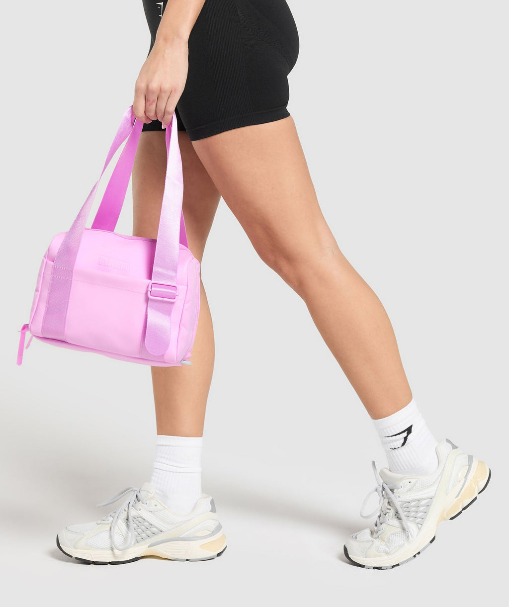 gymshark-everyday-mini-holdall-sour-pink-ss25