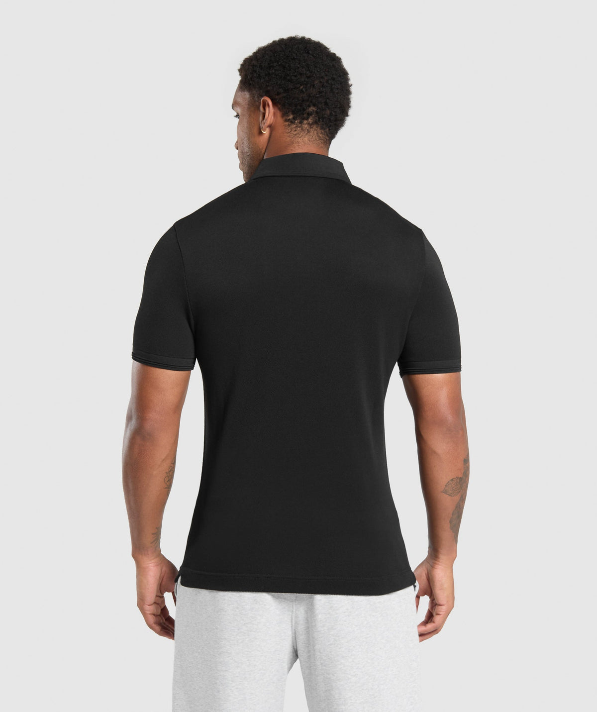 gymshark-flat-knit-polo-shirt-black-aw24