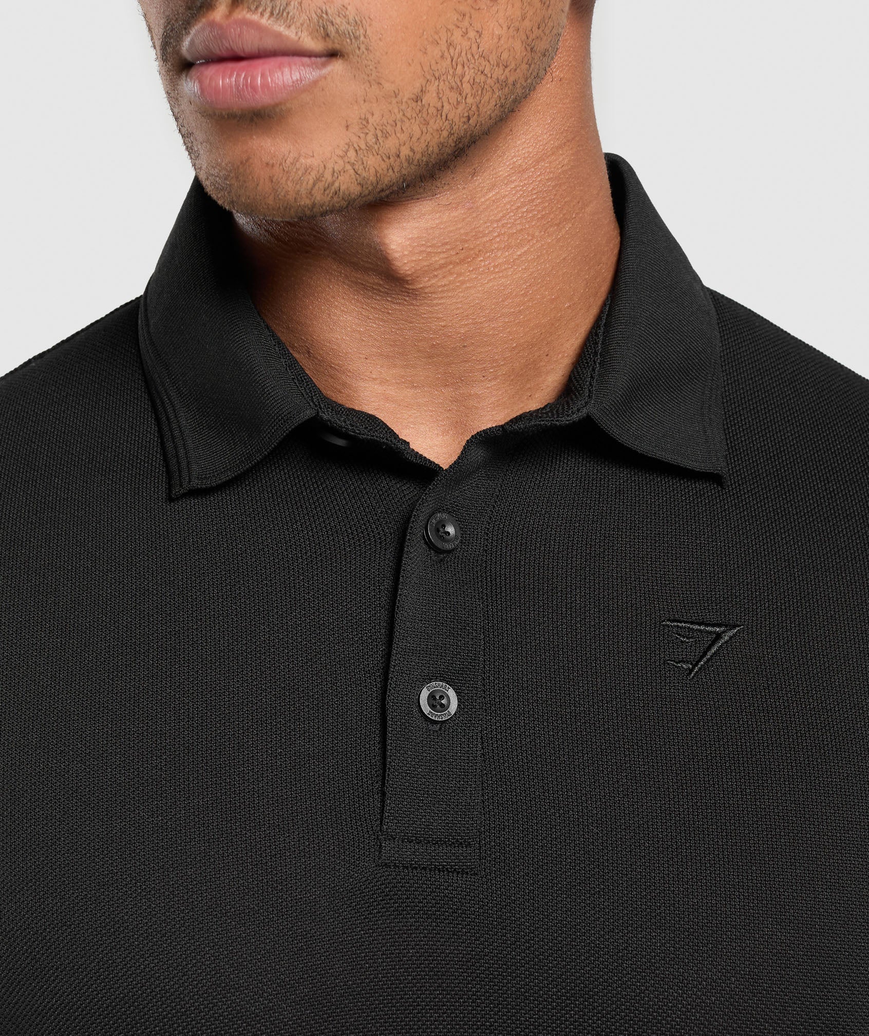gymshark-flat-knit-polo-shirt-black-aw24