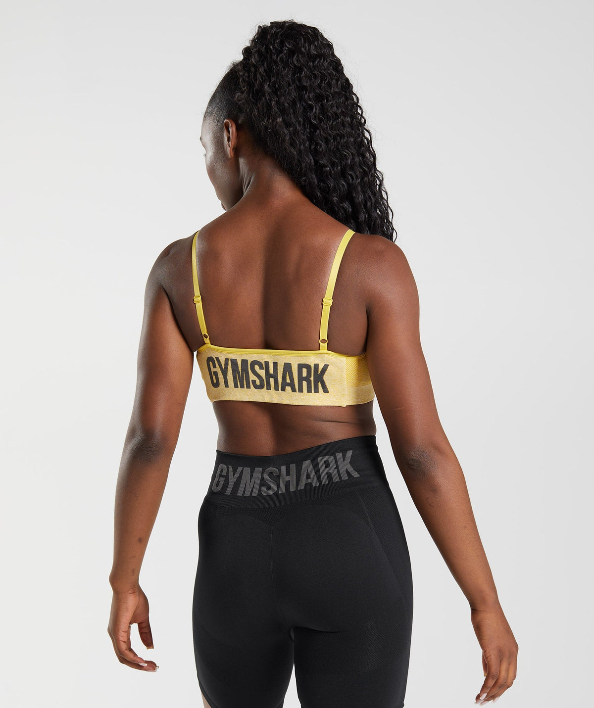 gymshark-flex-strappy-sports-bra-medallion-yellow-white-marl-aw22