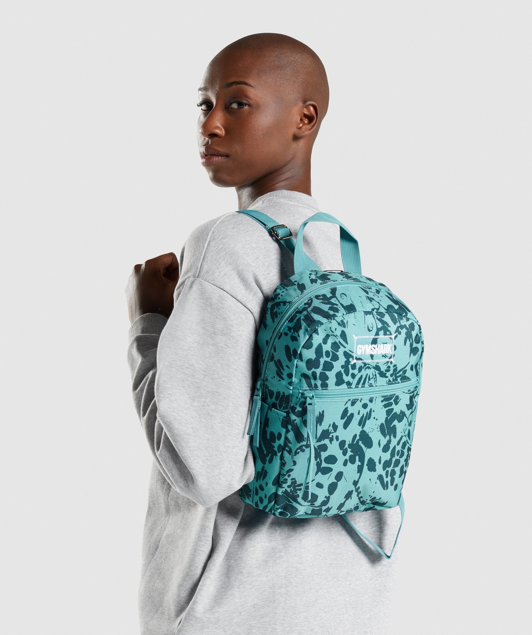 gymshark-adapt-animal-graphic-mini-lifestyle-backpack-teal-print-aw21