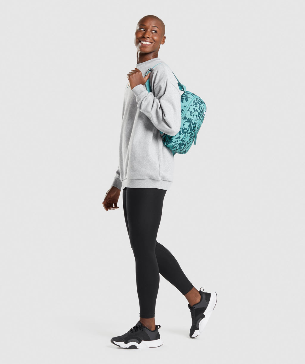 gymshark-adapt-animal-graphic-mini-lifestyle-backpack-teal-print-aw21
