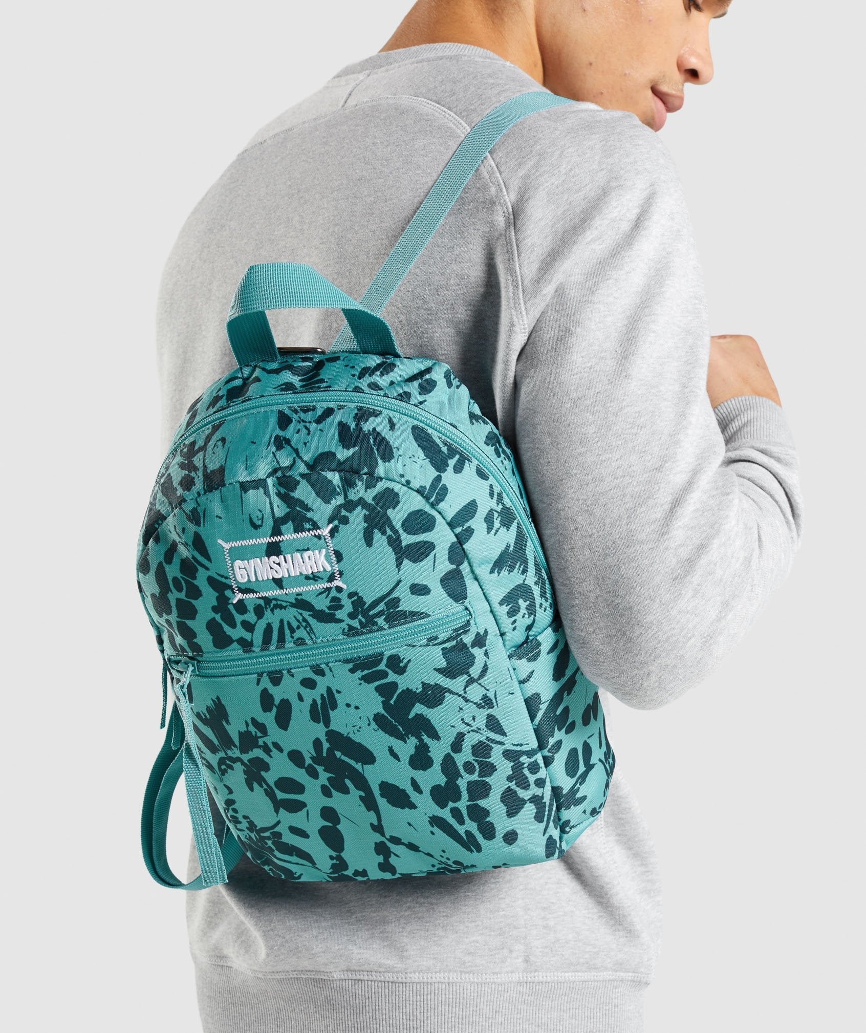 gymshark-adapt-animal-graphic-mini-lifestyle-backpack-teal-print-aw21