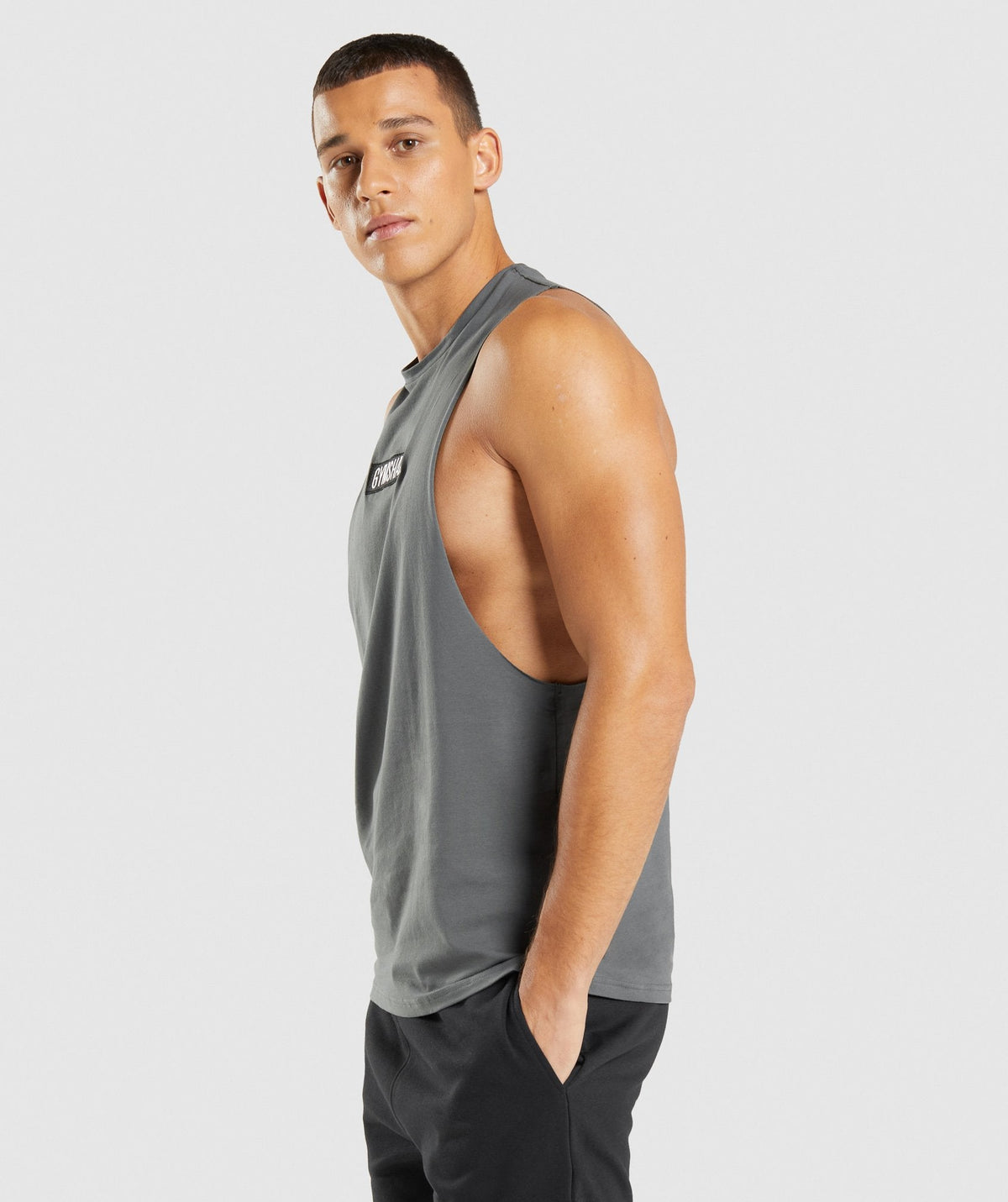 gymshark-central-drop-arm-tank-charcoal-aw21