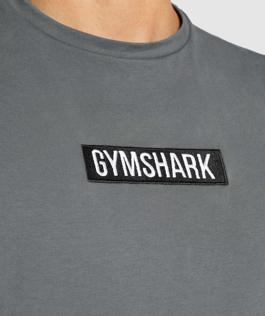 gymshark-central-drop-arm-tank-charcoal-aw21